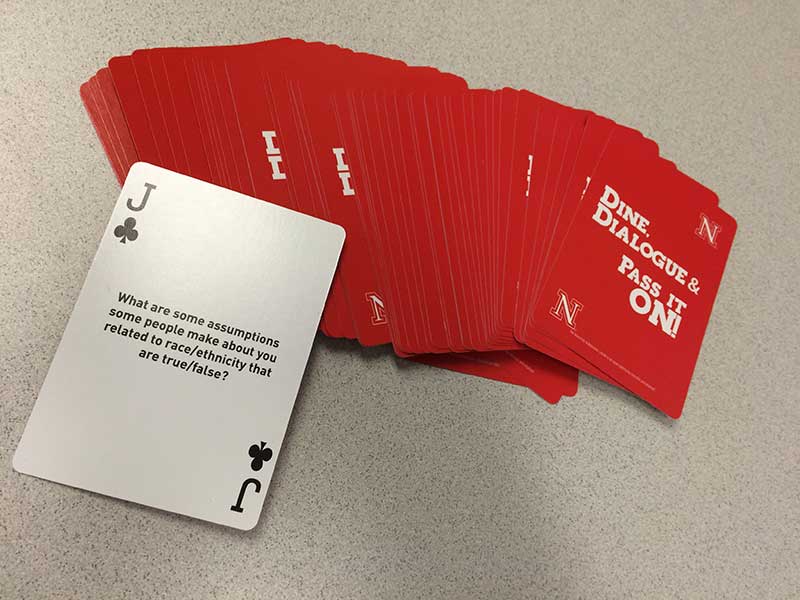 Dine, Dialogue and Pass It On cards used to explore inclusive conversation