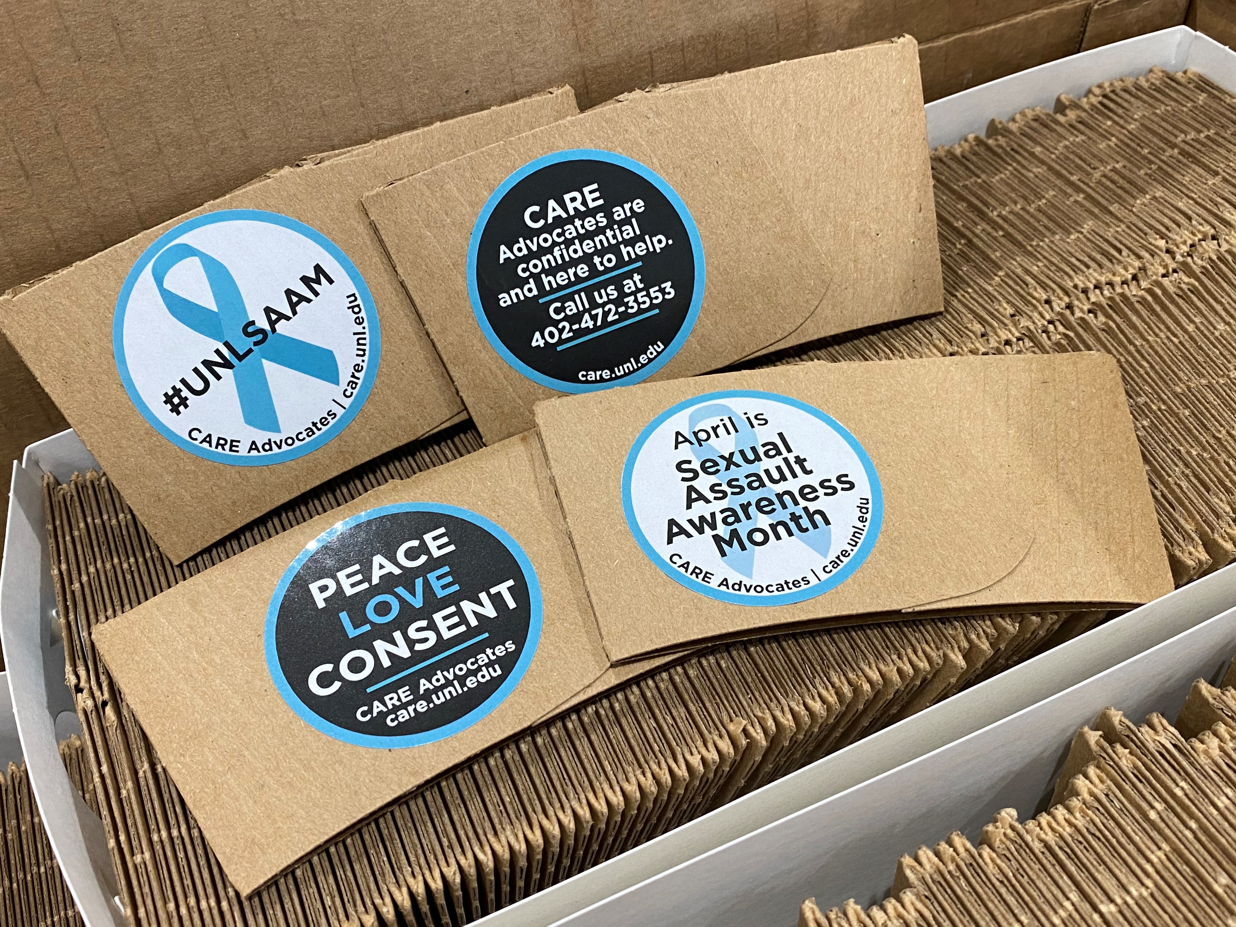 Coffee sleeves with messages promoting Sexual Assault Awareness Month