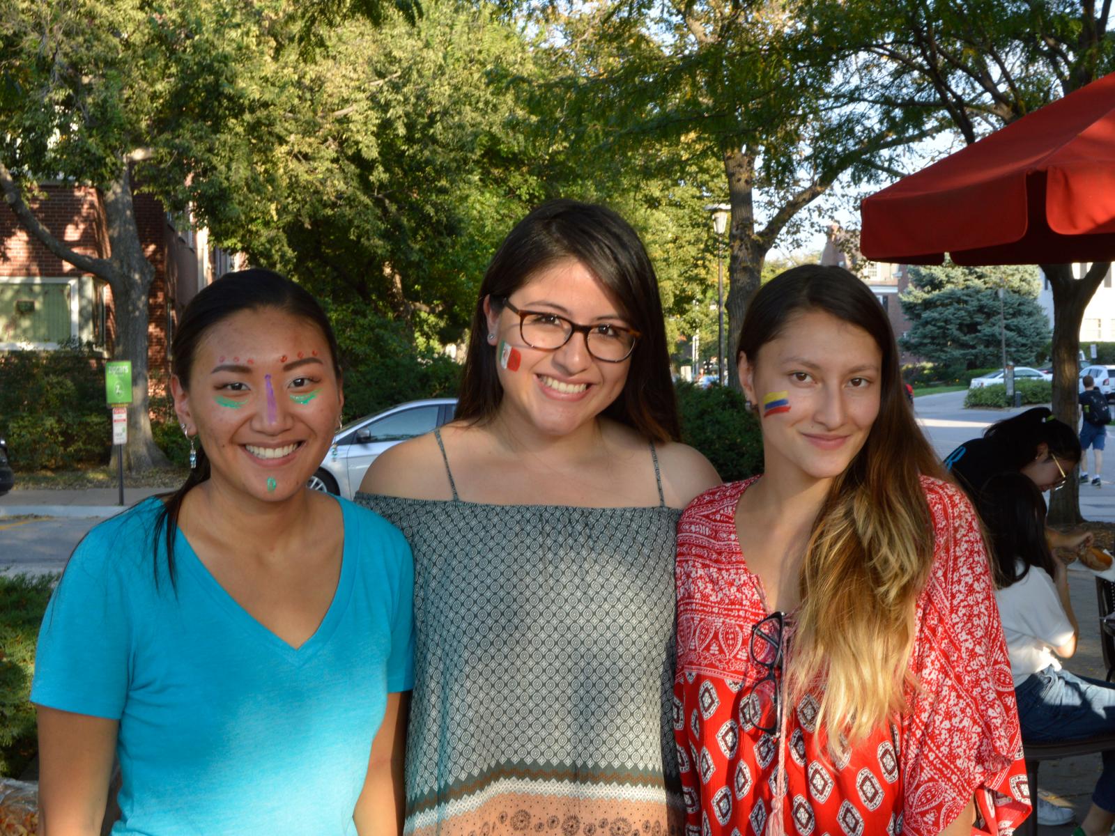 Students with facepaint celebrate Hispanic heritage at Fiesta on the Green at the University of Nebraska-Lincoln.
