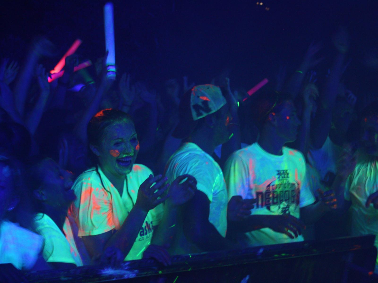 University of Nebraska-Lincoln students dance and enjoy a paint party in the heart of campus
