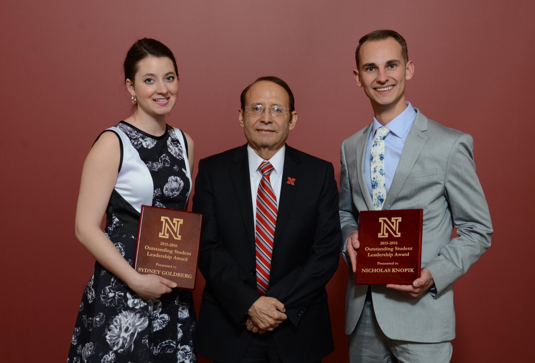2016 Outstanding Student Leadership Award recipients Sydney Goldberg and Nicholas Knopik with Dr. Juan Franco