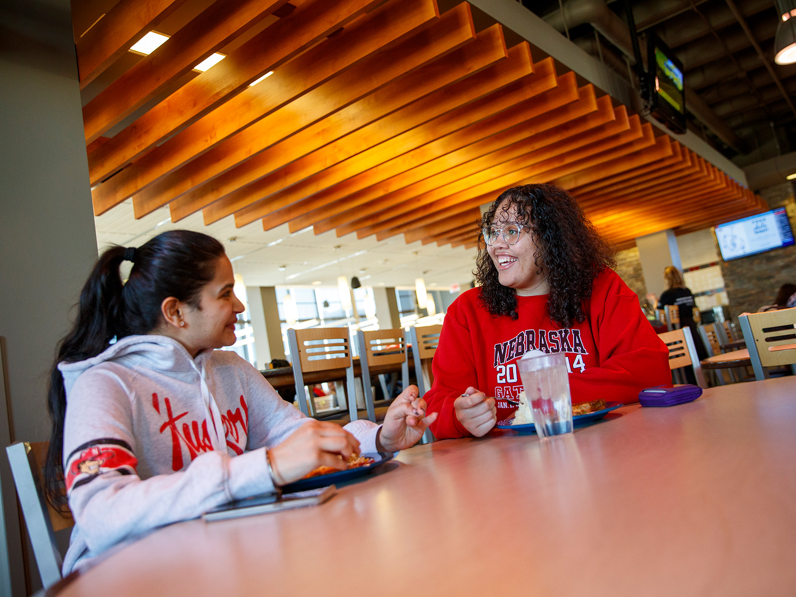 Students enjoy food and conversation in the Abel Dining Center.