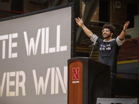 Alex Chapman talks during the student-led "Hate Will Never Win" rally at the Coliseum on Feb. 14, 2018.