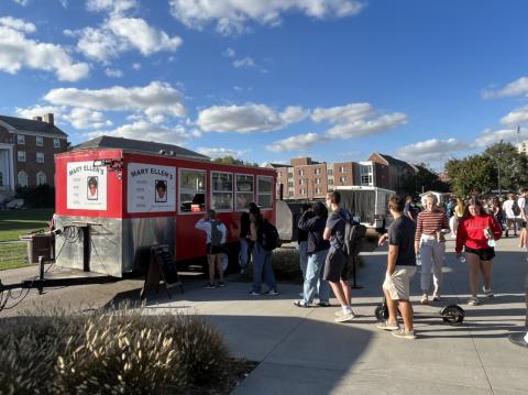 Students place orders Mary Ellen's at the 2021 Food Truck Festival outside the Willa Cather Dining Complex.
