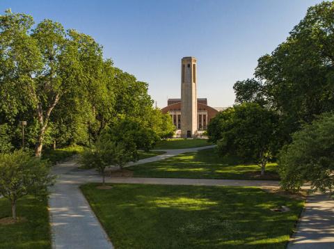 UNL campus with Mueller Tower and Coliseum in the background.