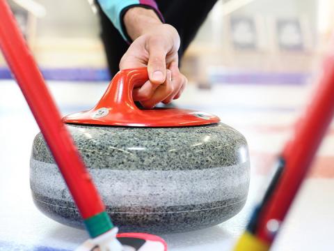 Curling stone on ice