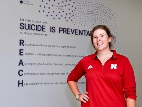Kate Smith, senior graphic design major from Detroit Lakes, Minnesota, used her artistic talents and background working in mental health to create a display highlighting the importance of suicide prevention and spread the message that even one conversation with a person could save their life. 