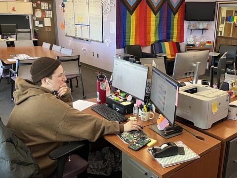 Ash Turner, graduate assistant, works in the LGBTQA+ Center Jan. 31. The center was renovated in 2019, and will expand again in the summer. [Deann Gayman | University Communication]