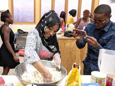 The Mandela Fellows celebrated America's Independence Day by making popular foods from their home countries for a potluck picnic at St. Mark's On-The-Campus.