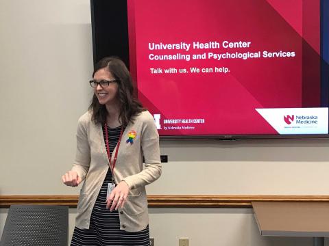 Cynthia Von Seggern, psychologist and group and outreach coordinator with CAPS, gives a presentation explaining counseling services available through the University Health Center managed by Nebraska Medicine. 