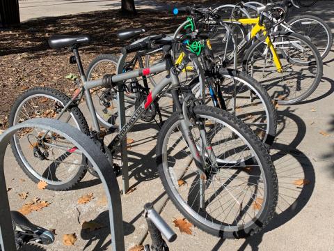 Bicycles parked in a bike rack at the Nebraska Union.