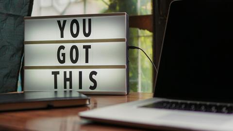 Sign on a desk that says "You Got This"