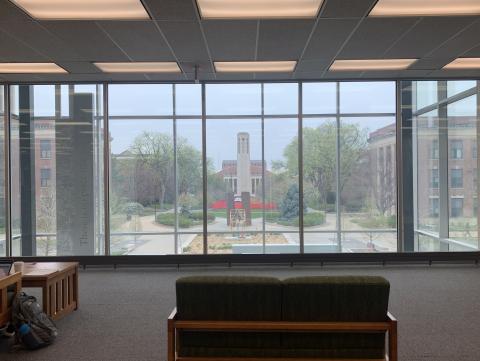 Large picture window in Love Library wiht a view of Mueller Tower. [photo by Kirsten Wandrey | Student Affairs]
