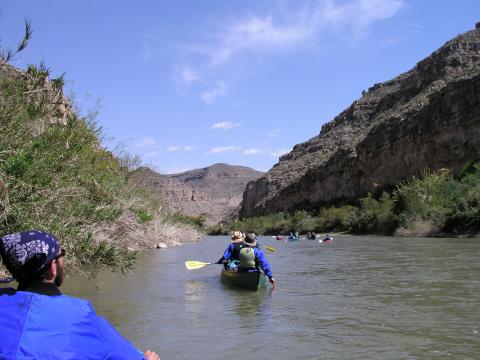 UNL students paddle through a canyon of the Rio Grande River on a canoe trip organized by Outdoor Adventures at the University of Nebraska–Lincoln. [courtesy photo | Outdoor Adventures]