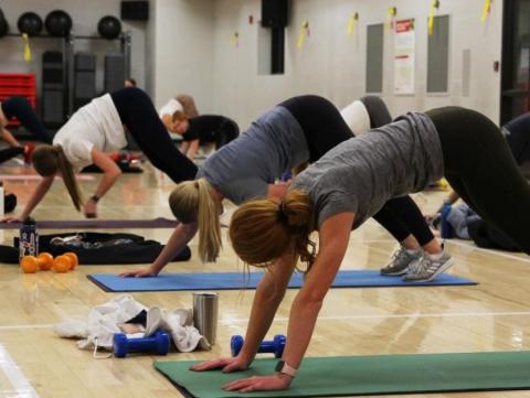 Huskers practice yoga in the Campus Rec Center at the University of Nebraska-Lincoln.